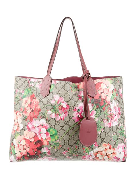 gucci medium tote blooms|Gucci Bloom pouch.